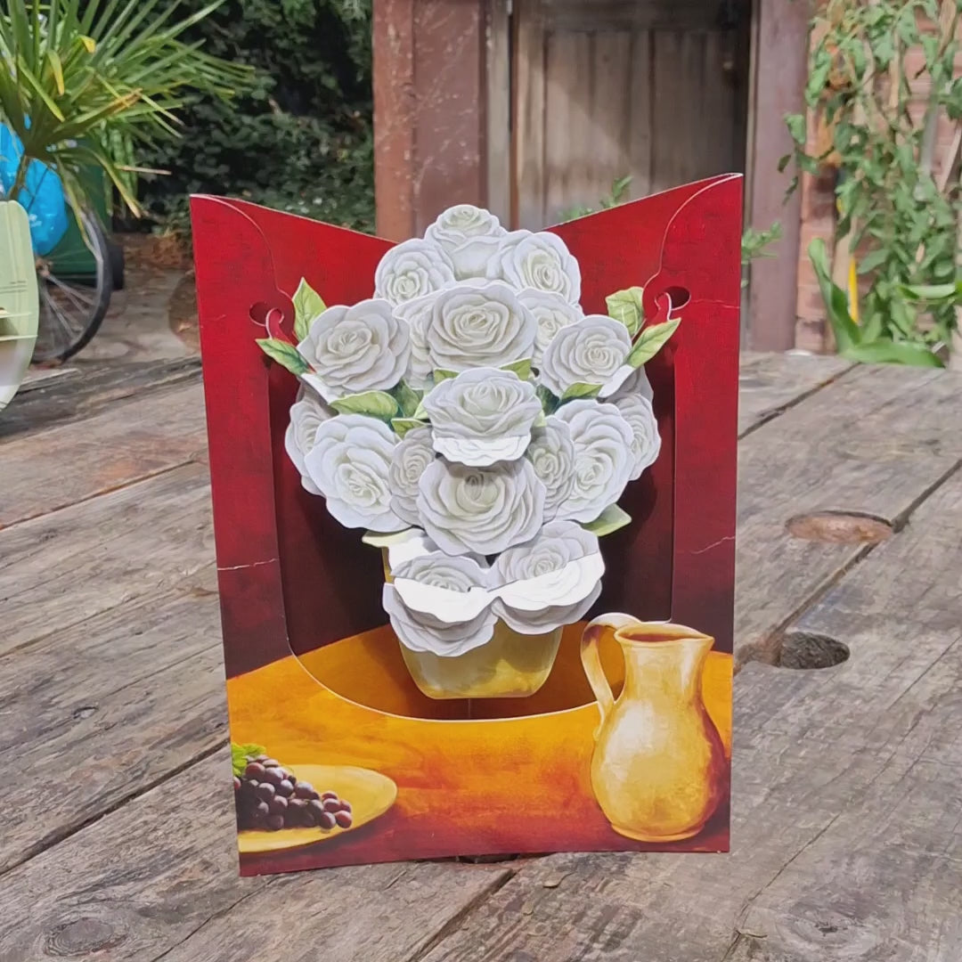 vidéo de notre carte en 3D bouquets de roses blanches sur fond rouge et orange
